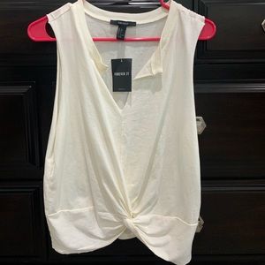 Forever 21 tee. Cream colored. Size large. NWT.